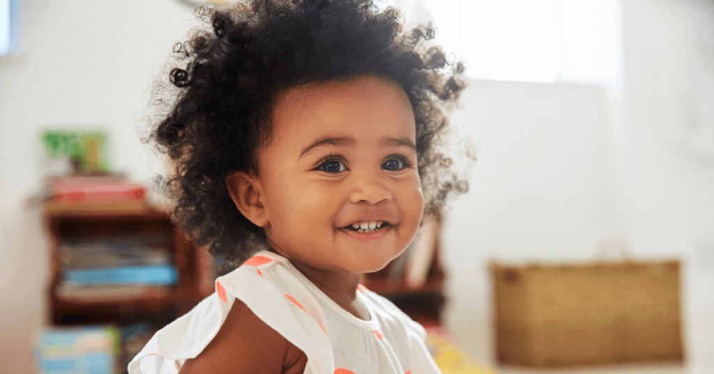 Smiling Toddler in an Apartment at Bellfort Ave