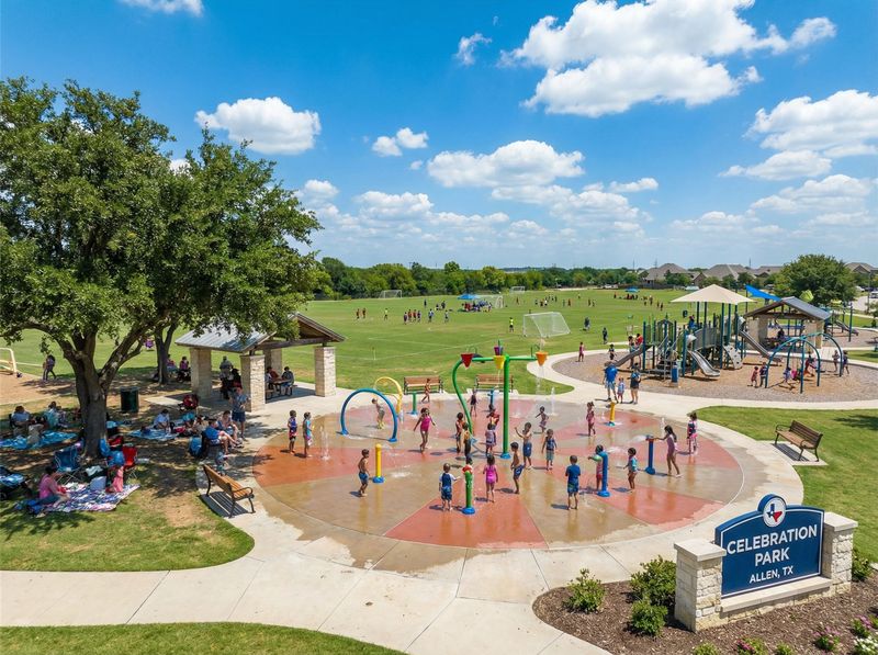 Children playing at Celebration Park splash pad.