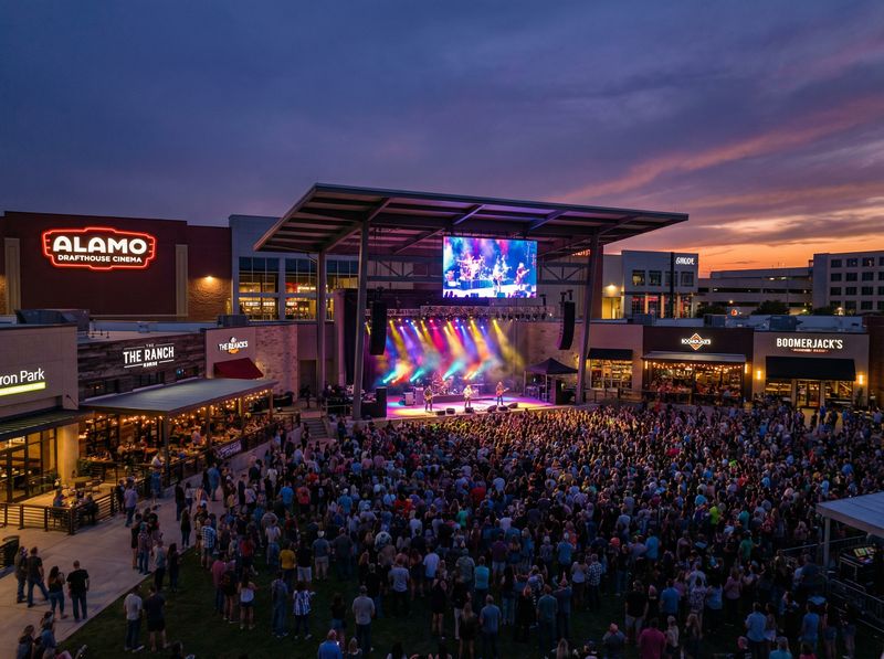 Outdoor concert at bustling entertainment venue