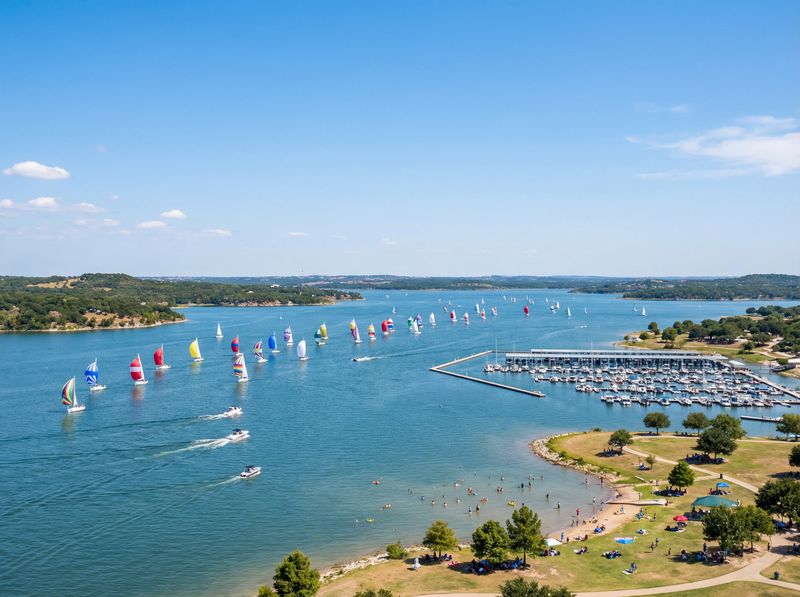 Colorful sailboats on a sunny lake