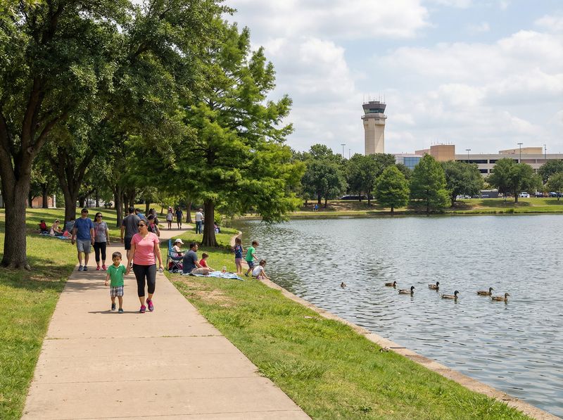People walking by a lakeside path
