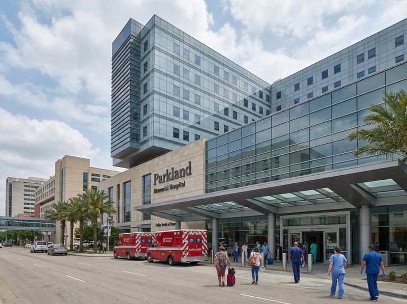 Parkland Hospital entrance with ambulances