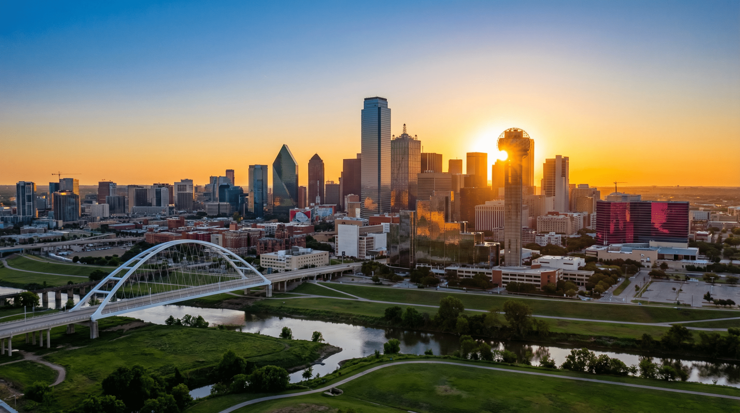 Sunset over Dallas skyline with bridge